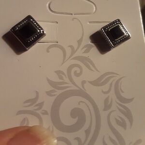 Black and silver stud earrings